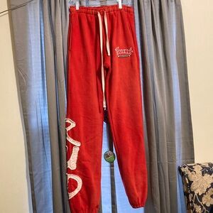 NOT WORKER PLAYA Red Sweatpants,From the Streetwear Brand Playamade 
SIZE 2XL